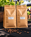 Two Goldsmith & Sons Signature Blend 500g whole bean coffee bags with roasted coffee beans. Copy